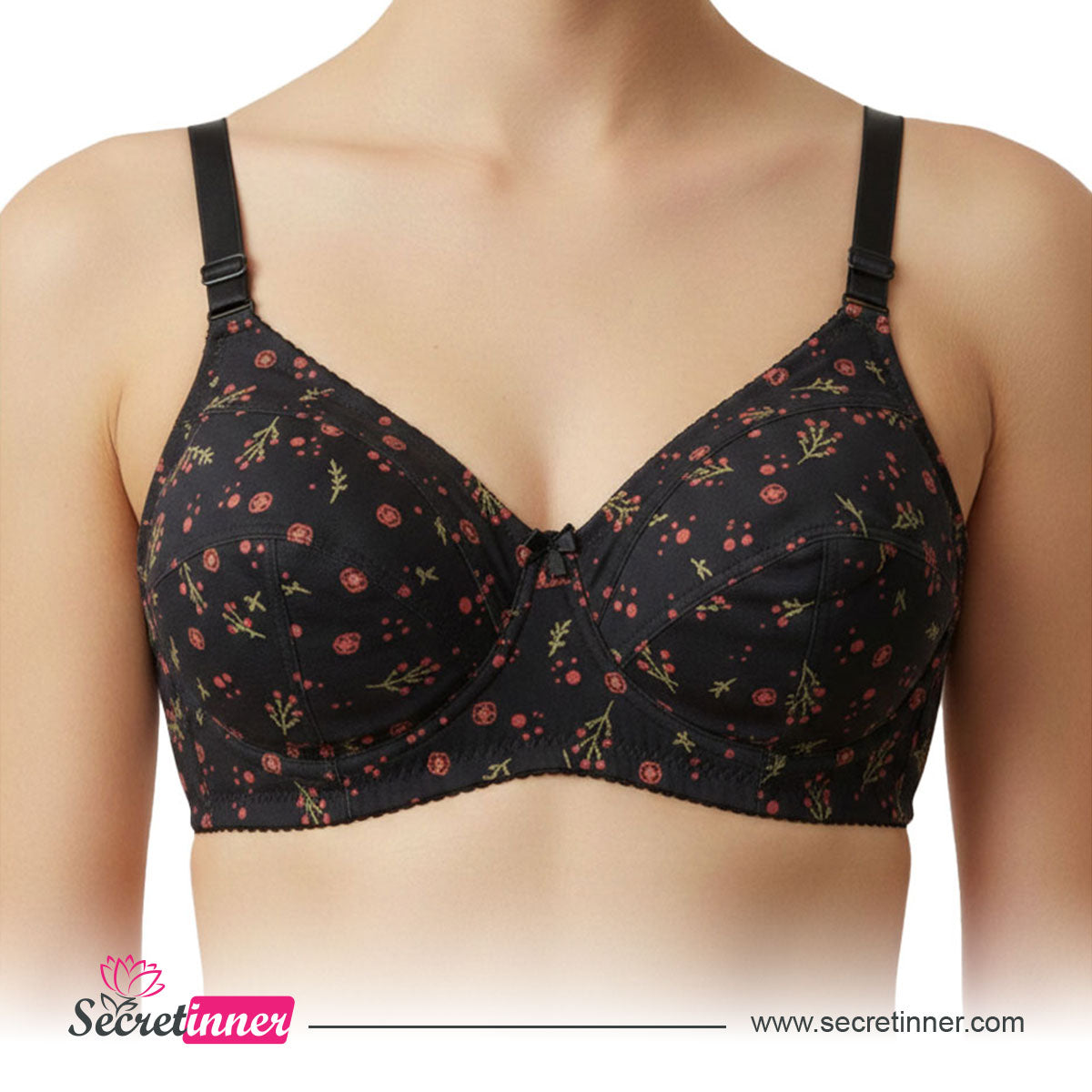 Black floral-patterned bra on a white background with Secret Inner branding.