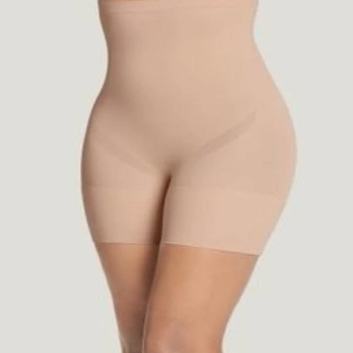 Beige shapewear on a plain background