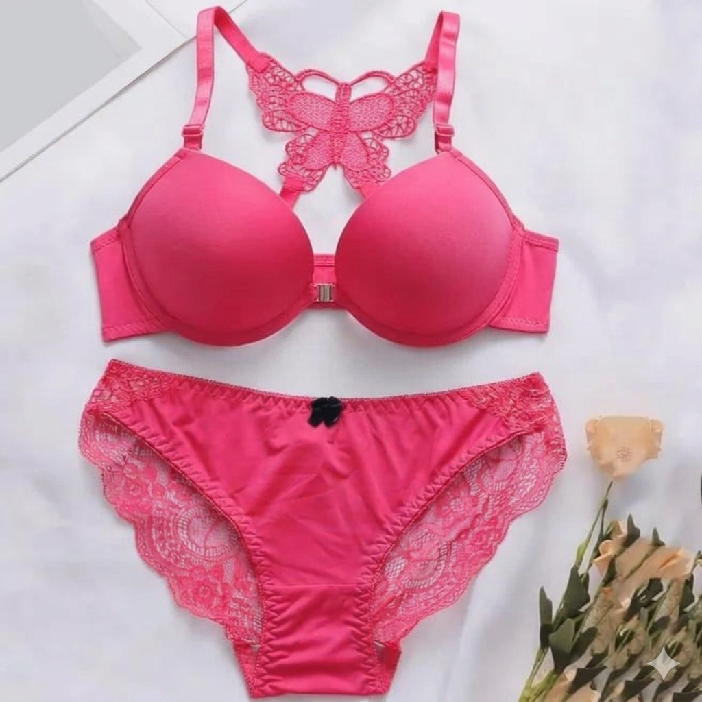 Pink bra and panties set with lace details on a white background