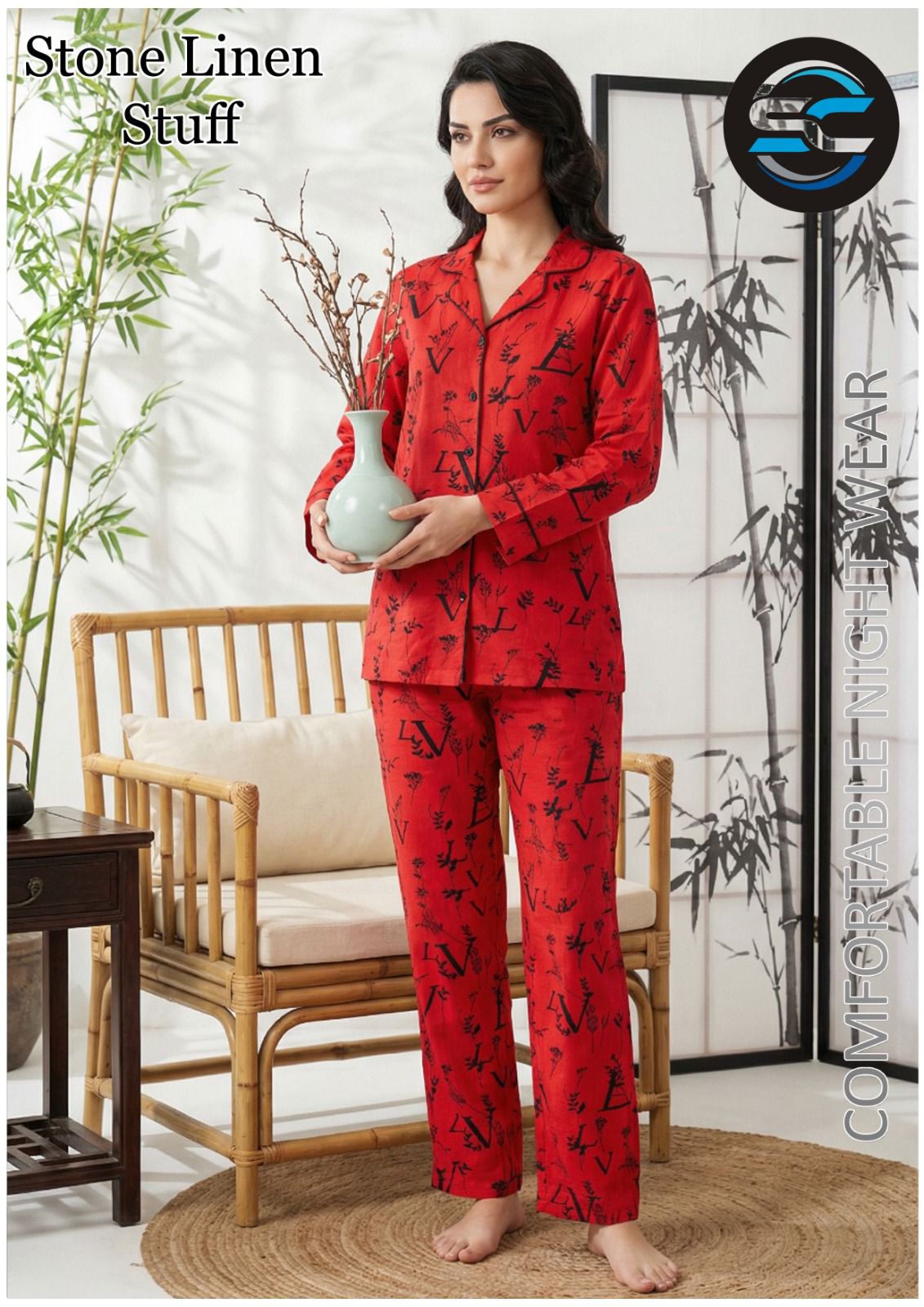 Woman wearing red pajama set with black patterns, sitting in a room with a chair and plants.